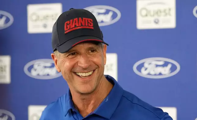 New York Giants head coach John Harbaugh speaks during a news conference after an NFL football training camp, Wednesday, July 29, 2026, in White Sulphur Springs, W.Va. (AP Photo/Chris Carlson)