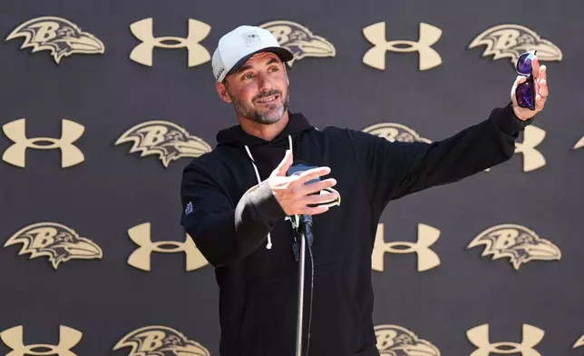 Baltimore Ravens head coach Jesse Minter speaks during a press conference at the team's NFL football training camp, Thursday, July 30, 2026, at the Under Armour Performance Center in Owings Mills, Md. (AP Photo/Stephanie Scarbrough)