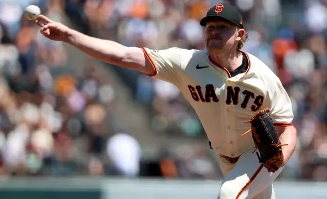 San Francisco Giants pitcher Logan Webb throws against the Detroit Tigers during the first inning of a baseball game in San Francisco, Sunday, Aug. 9, 2026. (AP Photo/Jed Jacobsohn)