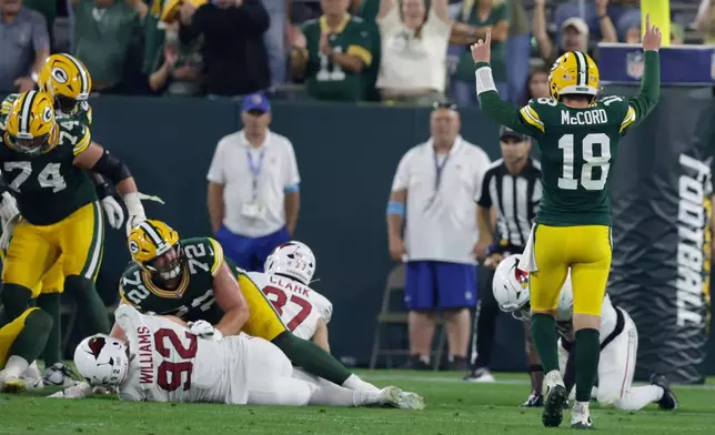 Green Bay Packers' Kyle McCord celebrates a two-point conversion during the second half of a preseason NFL football game against the Arizona Cardinals Friday, Aug. 28, 2026, in Green Bay, Wis. (AP Photo/Matt Ludtke)