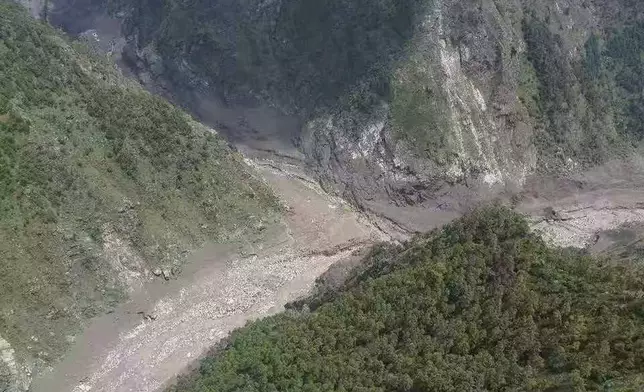 This photo released by Xinhua News Agency, shows a mudslide-hit area near Gyirong Port in southwestern China's Tibetan Autonomous Region on Wednesday, Aug. 26, 2026. (Xinhua via AP)
