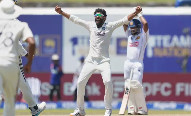 India's Ravindra Jadeja celebrates the dismissal of Sri Lanka's captain Dhananjaya de Silva during the day five of the first cricket test match between Sri Lanka and India in Galle, Sri Lanka, Wednesday, Aug. 19, 2026. (AP Photo/Eranga Jayawardena)