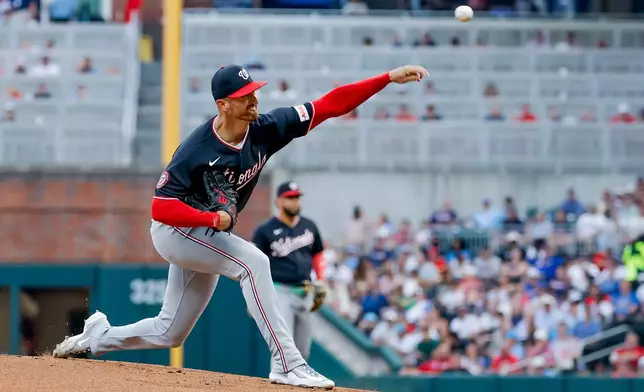Washington Nationals pitcher Foster Griffin delivers to an Atlanta Braves batter during the first inning of a baseball game, Friday, July 31, 2026, in Atlanta. (AP Photo/Erik S. Lesser)