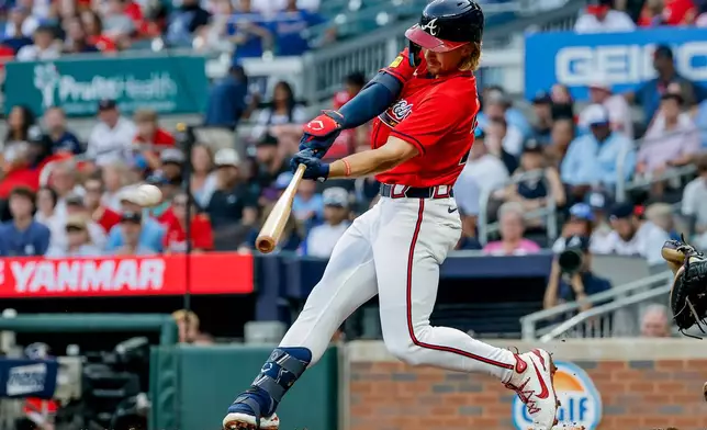 Atlanta Braves' Jim Jarvis hits an RBI single against the Washington Nationals during the second inning of a baseball game, Friday, July 31, 2026, in Atlanta. (AP Photo/Erik S. Lesser)