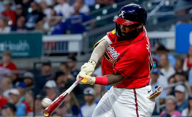 Atlanta Braves' Michael Harris II hits a three-run home run against the Washington Nationals during the sixth inning of a baseball game, Friday, July 31, 2026, in Atlanta. (AP Photo/Erik S. Lesser)