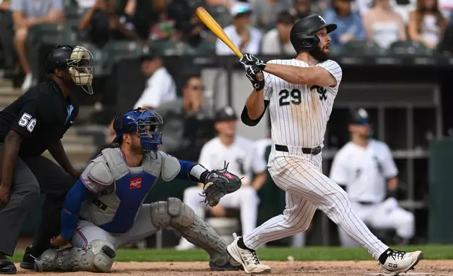 Chicago White Sox's Tristan Peters (29) watches his walkoff solo home run against the New York Mets during the ninth inning of a baseball game in Chicago, Sunday, Aug. 23, 2026. (AP Photo/Paul Beaty)
