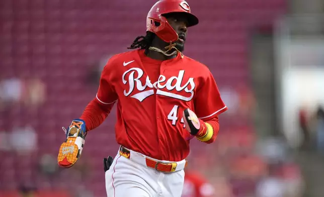 Cincinnati Reds' Elly De La Cruz reaches third base on a single by JJ Bleday during the first inning of the second game of a baseball doubleheader against the St. Louis Cardinals, Monday, Aug. 17, 2026, in Cincinnati. (AP Photo/Tanner Pearson)
