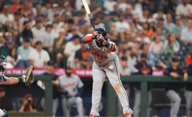 Detroit Tigers' Gleyber Torres is hit by a pitch in the eighth inning of a baseball game against the Seattle Mariners, Wednesday, Aug. 5, 2026, in Seattle. (AP Photo/Kevin Ng)
