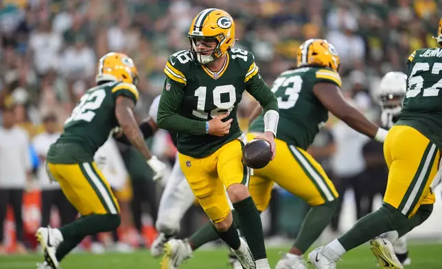 Green Bay Packers' Kyle McCord looks to hand the ball off during the first half of a preseason NFL football game against the Arizona Cardinals Friday, Aug. 28, 2026, in Green Bay, Wis. (AP Photo/Abbie Parr)