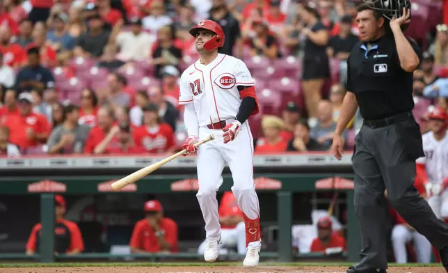 Cincinnati Reds' Sal Stewart, left, watches his solo home run during the first inning of a baseball game against the Pittsburgh Pirates in Cincinnati, Sunday, Aug. 2, 2026. (AP Photo/Tanner Pearson)