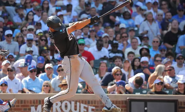 Chicago White Sox's Braden Montgomery hits a two-run double during the eighth inning of a baseball game against the Chicago Cubs, Wednesday, Aug. 19, 2026, in Chicago. (AP Photo/Melissa Tamez)