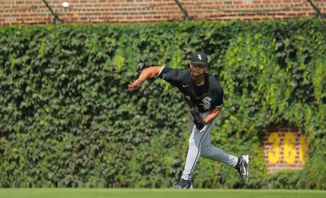Chicago White Sox's Braden Montgomery throws the ball to third base during the sixth inning of a baseball game against the Chicago Cubs, Wednesday, Aug. 19, 2026, in Chicago. (AP Photo/Melissa Tamez)