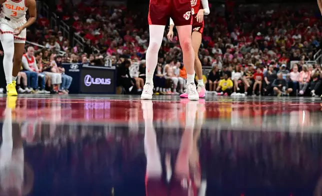 Indiana Fever guard Caitlin Clark (22) shoots a free throw during the first half of a WNBA basketball game, Friday, Aug. 28, 2026, in Indianapolis. (AP Photo/Marc Lebryk)