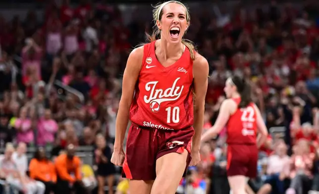 Indiana Fever guard Lexie Hull (10) reacts to a basket during the first half of a WNBA basketball game against the Connecticut Sun, Friday, Aug. 28, 2026, in Indianapolis. (AP Photo/Marc Lebryk)