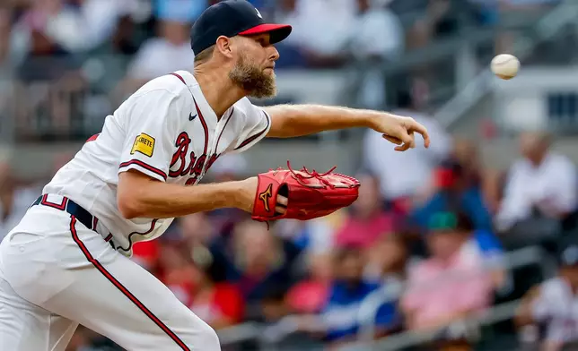Atlanta Braves pitcher Chris Sale delivers to a Los Angeles Dodgers batter during the first inning of a baseball game, Thursday, Aug. 27, 2026, in Atlanta. (AP Photo/Erik S. Lesser)