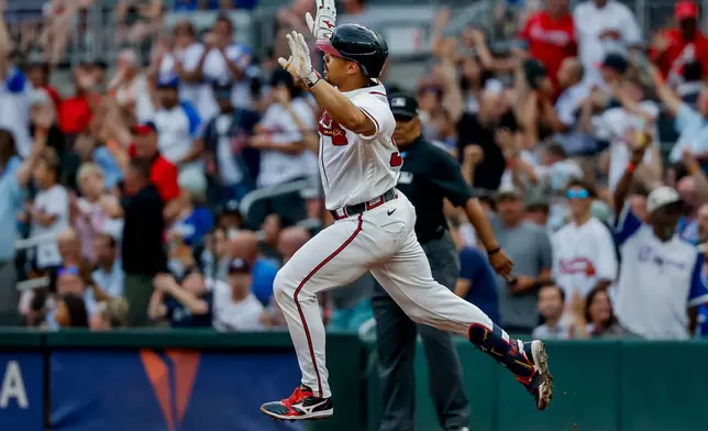 Atlanta Braves' Drake Baldwin celebrates while rounding the bases after hitting a solo home run against the Los Angeles Dodgers during the first inning of a baseball game, Thursday, Aug. 27, 2026, in Atlanta. (AP Photo/Erik S. Lesser)