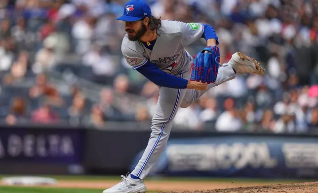 Toronto Blue Jays' Dylan Cease pitches during the fifth inning of a baseball game against the New York Yankees Saturday, Aug. 22, 2026, in New York. (AP Photo/Frank Franklin II)