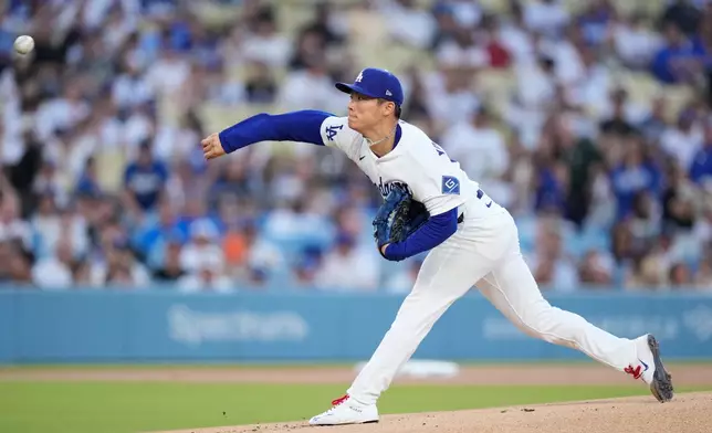 Los Angeles Dodgers starting pitcher Yoshinobu Yamamoto throws to the plate during the first inning of a baseball game against the Pittsburgh Pirates, Friday, Aug. 21, 2026, in Los Angeles. (AP Photo/Mark J. Terrill)