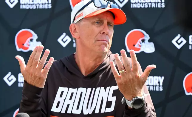 Cleveland Browns head coach Todd Monken speaks to reporters after a joint NFL football practice with the Buffalo Bills in Berea, Ohio, Thursday, Aug. 20, 2026. (AP Photo/David Richard)