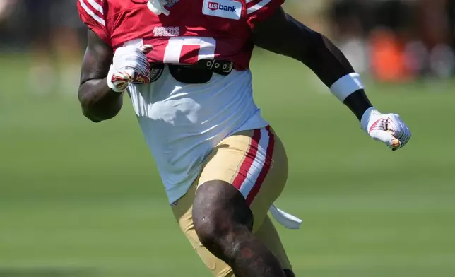 San Francisco 49ers wide receiver Deebo Samuel Sr. runs during the NFL football team's training camp, Saturday, Aug. 1, 2026, in Santa Clara, Calif. (AP Photo/Jeff Chiu)