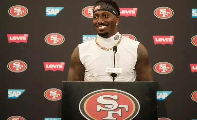 San Francisco 49ers wide receiver Deebo Samuel Sr. speaks at a news conference during the NFL football team's training camp, Saturday, Aug. 1, 2026, in Santa Clara, Calif. (AP Photo/Jeff Chiu)