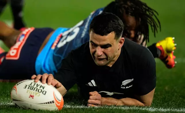 New Zealand's Josh Moorby scores a try during a rugby match between Bulls and New Zealand, in Pretoria, South Africa, Saturday, Aug. 15, 2026. (AP Photo/Themba Hadebe)