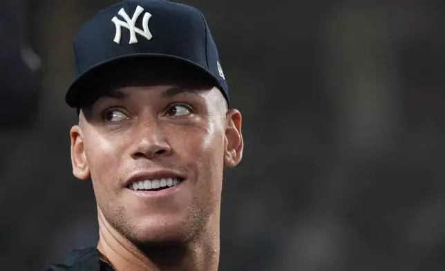 New York Yankees' Aaron Judge smiles towards fans during a baseball game against the Houston Astros, Wednesday, Aug. 26, 2026, in New York. (AP Photo/Ryan Murphy)