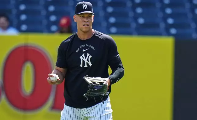 New York Yankees' Aaron Judge throws before a baseball game against the Toronto Blue Jays Sunday, Aug. 23, 2026, in New York. (AP Photo/Frank Franklin II)
