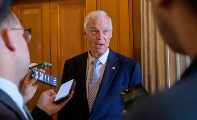Sen. Ron Johnson, R-Wis., talks with reporters outside of the Senate chamber during a vote at the U.S. Capitol, Friday, August 7, 2026, in Washington. (AP Photo/Rod Lamkey, Jr.)
