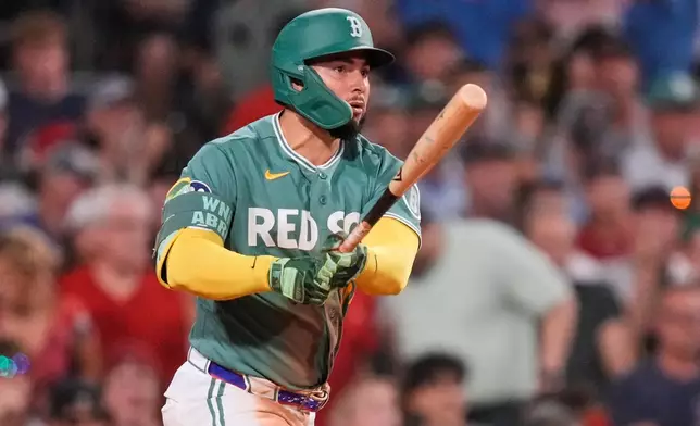 Boston Red Sox's Wilyer Abreu watches his RBI single during the fourth inning of a baseball game against the Athletics, Friday, Aug. 7, 2026, in Boston. (AP Photo/Charles Krupa)