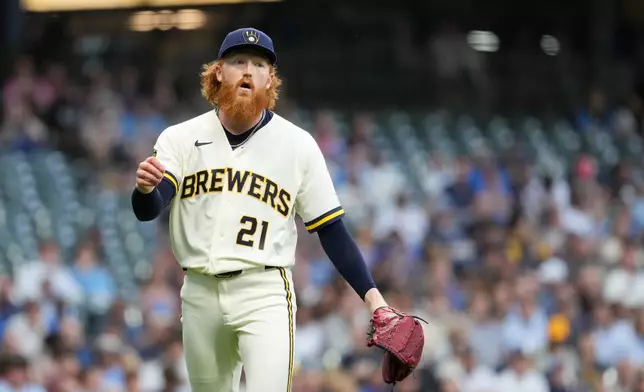 Milwaukee Brewers' Dustin May reacts during the second inning of a baseball game against the Seattle Mariners, Wednesday, Aug. 19, 2026, in Milwaukee. (AP Photo/Aaron Gash)