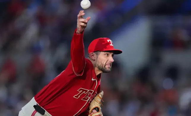 Texas Rangers pitcher Nathan Eovaldi throws during the first inning of a baseball game against the Baltimore Orioles, Friday, Aug. 7, 2026, in Arlington, Texas. (AP Photo/LM Otero)