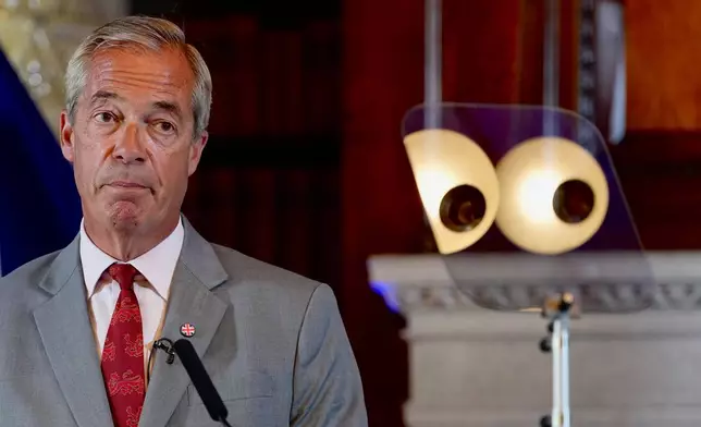 Nigel Farage, Leader of Britain's Reform UK party, speaks during a press conference in London, Monday, Aug. 10, 2026. (AP Photo/Kin Cheung)