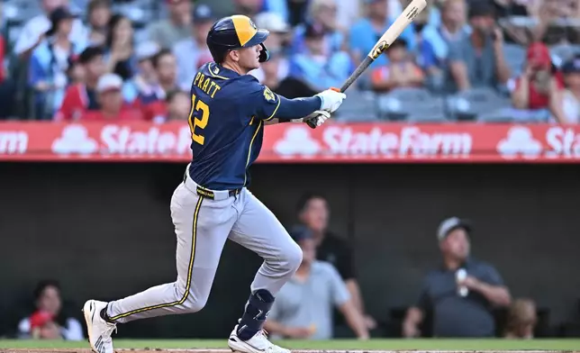 Milwaukee Brewers' Cooper Pratt watches his RBI double during the second inning of a baseball game against the Los Angeles Angels, Friday, July 31, 2026, in Anaheim, Calif. (AP Photo/William Liang)