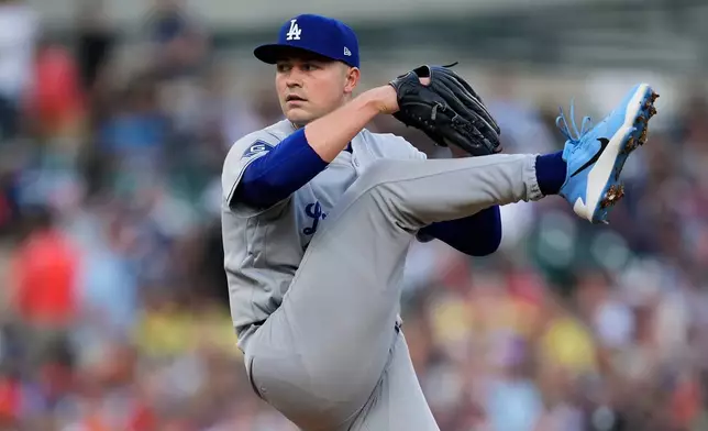 Los Angeles Dodgers pitcher Tarik Skubal throws against the Detroit Tigers during the first inning of a baseball game Friday, Aug. 28, 2026, in Detroit. (AP Photo/Paul Sancya)
