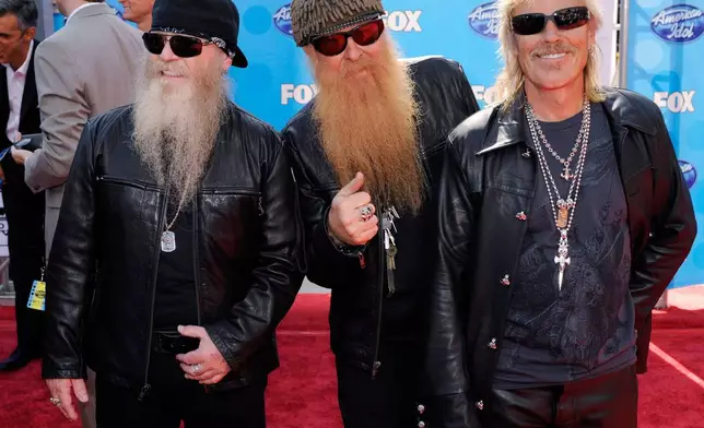 FILE - Dusty Hill, from left, Billy Gibbons and Frank Beard of ZZ Top appear at the "American Idol" finale in Los Angeles on May 21, 2008. (AP Photo/Chris Pizzello, File)