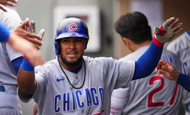 Chicago Cubs' Pedro Ramírez celebrates scoring on an RBI single from Carson Kelly against the Seattle Mariners during the eighth inning of a baseball game, Sunday, Aug. 23, 2026, in Seattle. (AP Photo/Lindsey Wasson)