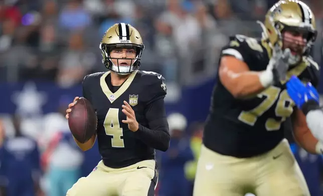 New Orleans Saints quarterback Zach Wilson (4) throws against the Dallas Cowboys during the second half a preseason NFL football game, in Arlington, Texas, Friday, Aug. 28, 2026. (AP Photo/Julio Cortez)