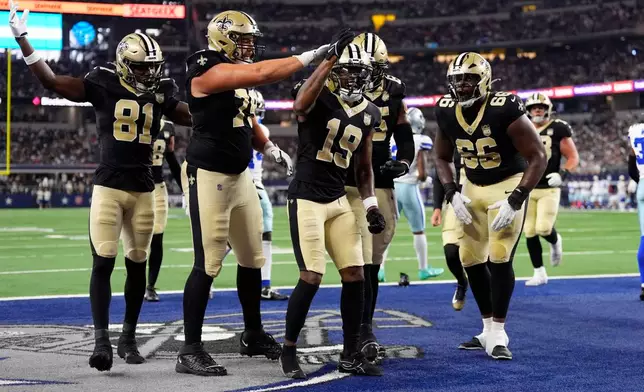 New Orleans Saints wide receiver Barion Brown (19) celebrates a touchdown against the Dallas Cowboys during the first half of a preseason NFL football game, in Arlington, Texas, Friday, Aug. 28, 2026. (AP Photo/Tony Gutierrez)