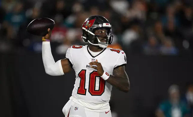 Tampa Bay Buccaneers quarterback Jalon Daniels (10) looks to pass the ball during the first half of an NFL preseason football game against the Jacksonville Jaguars, Friday, Aug. 28, 2026, in Jacksonville, Fla. (AP Photo/Phelan M. Ebenhack)