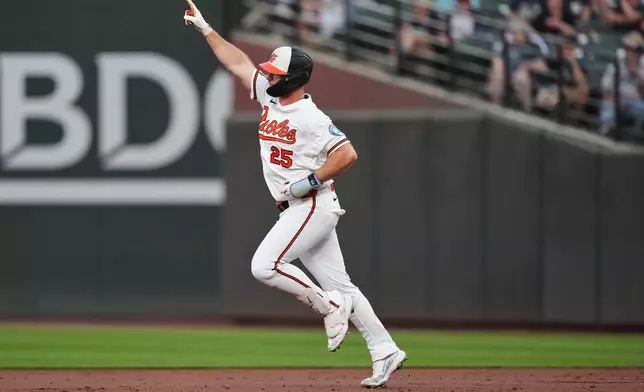 Baltimore Orioles' Pete Alonso (25) rounds the bases after hitting a home run during the third inning of a baseball game against the New York Yankees, Wednesday, Aug. 19, 2026, in Baltimore. (AP Photo/Stephanie Scarbrough)