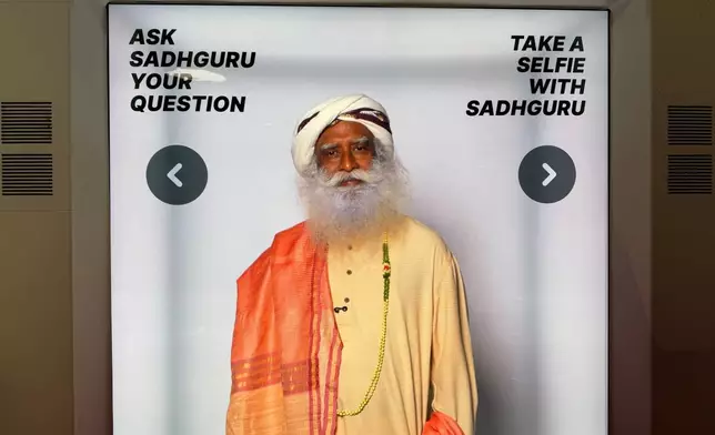 A lifelike Sadhguru chatbot powered by artificial intelligence is displayed Wednesday, Aug. 19, 2026, in Los Angeles. (AP Photo/Krysta Fauria)