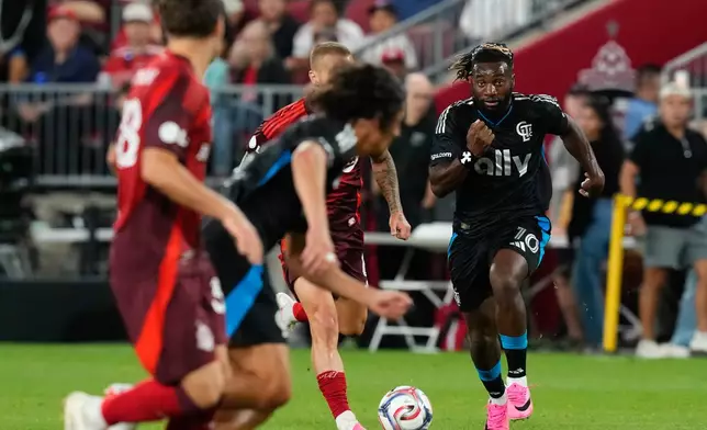 Charlotte FC's Allan Saint-Maximin (10) chases the ball during second half MLS action against Toronto FC in Toronto, on Wednesday, Aug. 19, 2026. (Chris Young/The Canadian Press via AP)