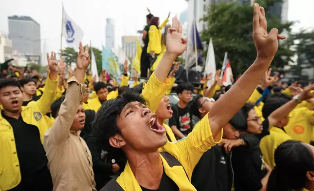 Student protesters shout slogans during a rally against the government's spending policies and what they described as the growing role of the military in civilian affairs in Jakarta, Indonesia, Tuesday, Aug. 18, 2026. (AP Photo/Tatan Syuflana)