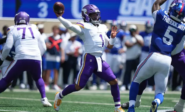 Minnesota Vikings quarterback Kyler Murray (1) throws a pass against the New York Giants during the first half of a preseason NFL football game Saturday, Aug. 15, 2026, in East Rutherford, N.J. (AP Photo/Frank Franklin II)