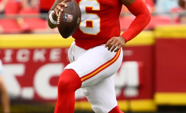 Kansas City Chiefs quarterback Justin Fields plays against the Los Angeles Rams during the first half of an NFL preseason football game, Saturday, Aug. 15, 2026, in Kansas City, MO. (AP Photo/Reed Hoffmann)