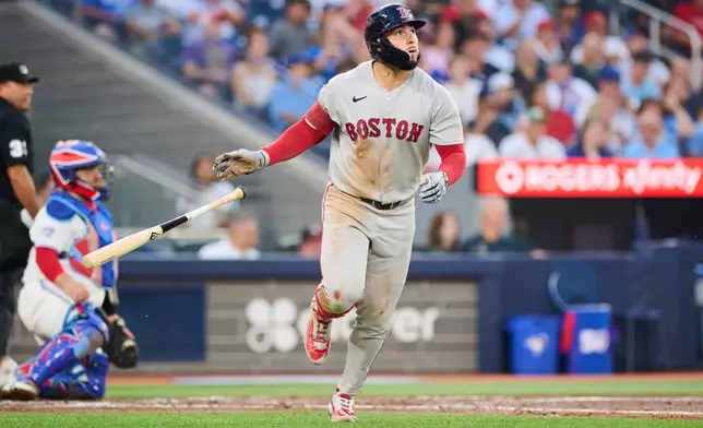 Boston Red Sox's Wilyer Abreu (52) rounds the bases after hitting a home run against the Toronto Blue Jays during fourth inning MLB baseball action in Toronto, on Tuesday, Aug. 11, 2026. (Sammy Kogan/The Canadian Press via AP)