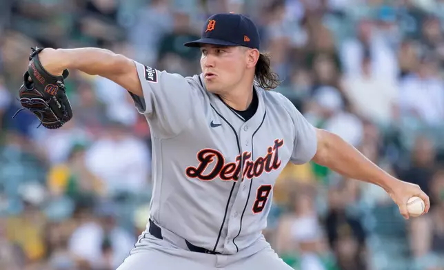 Detroit Tigers pitcher Tyler Holton throws to the Athletics during the first inning of a baseball game Friday, July 31, 2026, in West Sacramento, Calif. (AP Photo/Sara Nevis)