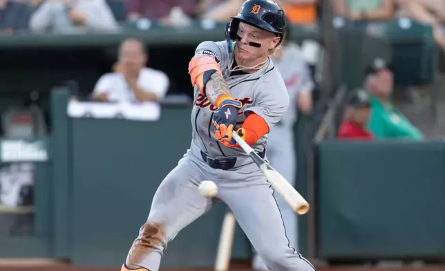 Detroit Tigers' Max Clark hits a single during the fourth inning of a baseball game against the Athletics, Friday, July 31, 2026, in West Sacramento, Calif. (AP Photo/Sara Nevis)