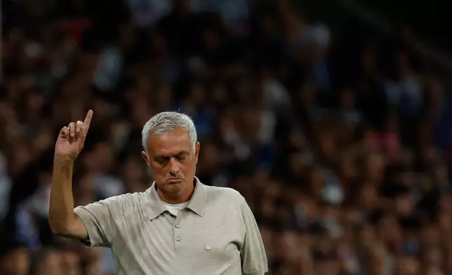 Real Madrid's head coach Jose Mourinho gestures during a Spanish La Liga soccer match between Espanyol and Real Madrid in Barcelona, Spain, Saturday, Aug. 22, 2026. (AP Photo/Joan Monfort)
